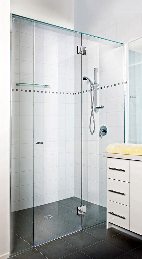 Frame less shower screen with centre door.